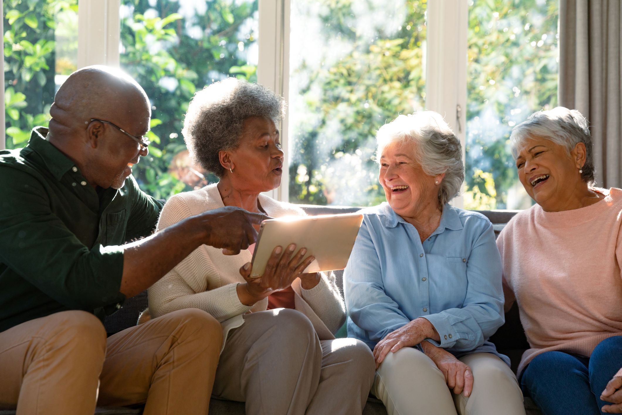 group of older adults enjoying socializing
