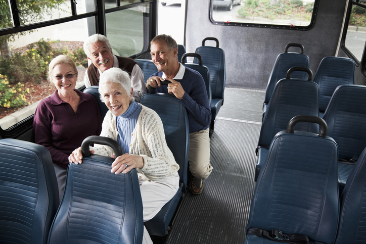 older adults on shuttle bus